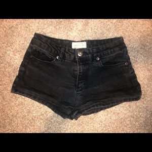 girl black jean shorts
